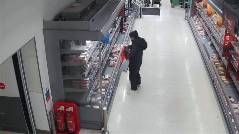 A woman seen shoplifting. Pic: Sussex Police. 