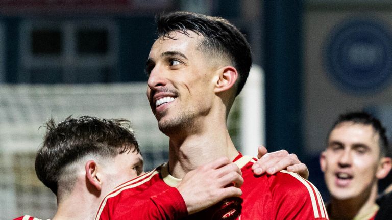DINGWALL, SCOTLAND - JANUARY 02: Aberdeen&#39;s Bojan Miovski celebrates scoring to make it 3-0 with his teammates during a cinch Premiership match between Ross County and Aberdeen at the Global Energy Stadium, on January 02, 2024, in Dingwall, Scotland. (Photo by Ross Parker / SNS Group)