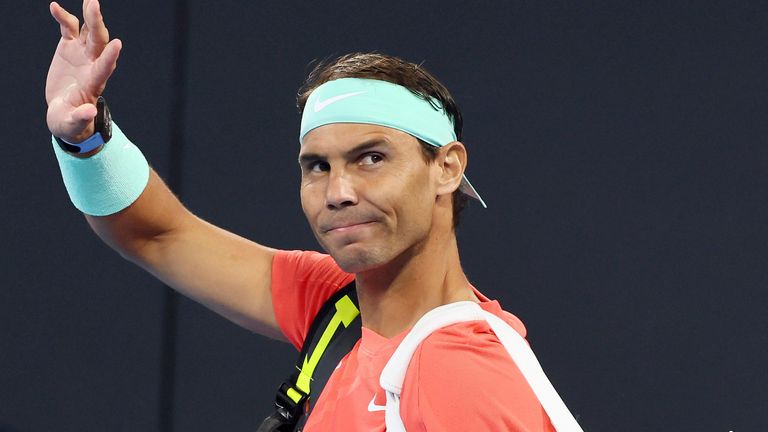 Rafael Nadal of Spain waves to the crowd in his doubles match against Australia&#39;s Max Purcell and Jordan Thompson during the Brisbane International tennis tournament in Brisbane, Australia, Sunday, Dec. 31, 2023. (AP Photo/Tertius Pickard)